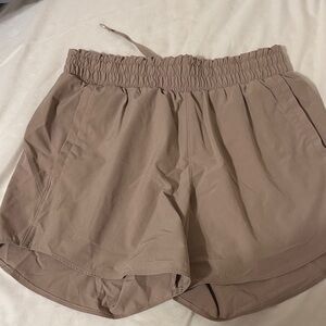 Under Armour Women's Athletic Shorts in Taupe